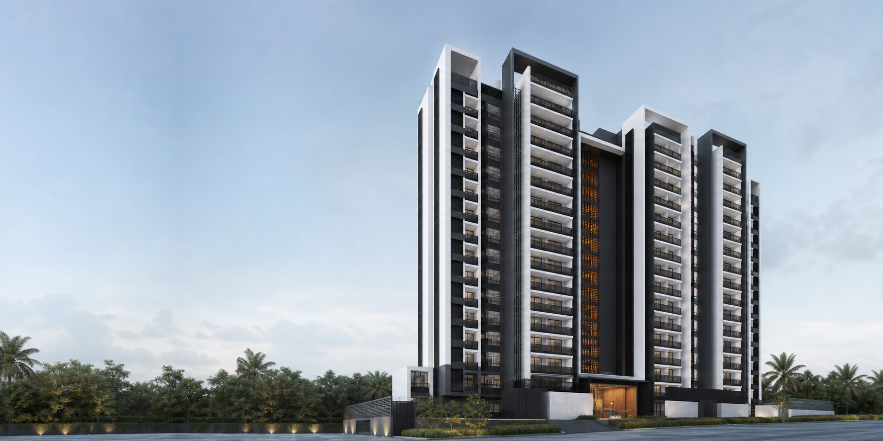 Embassy Millennium high-rise apartments with a landscaped entrance in Hoskote